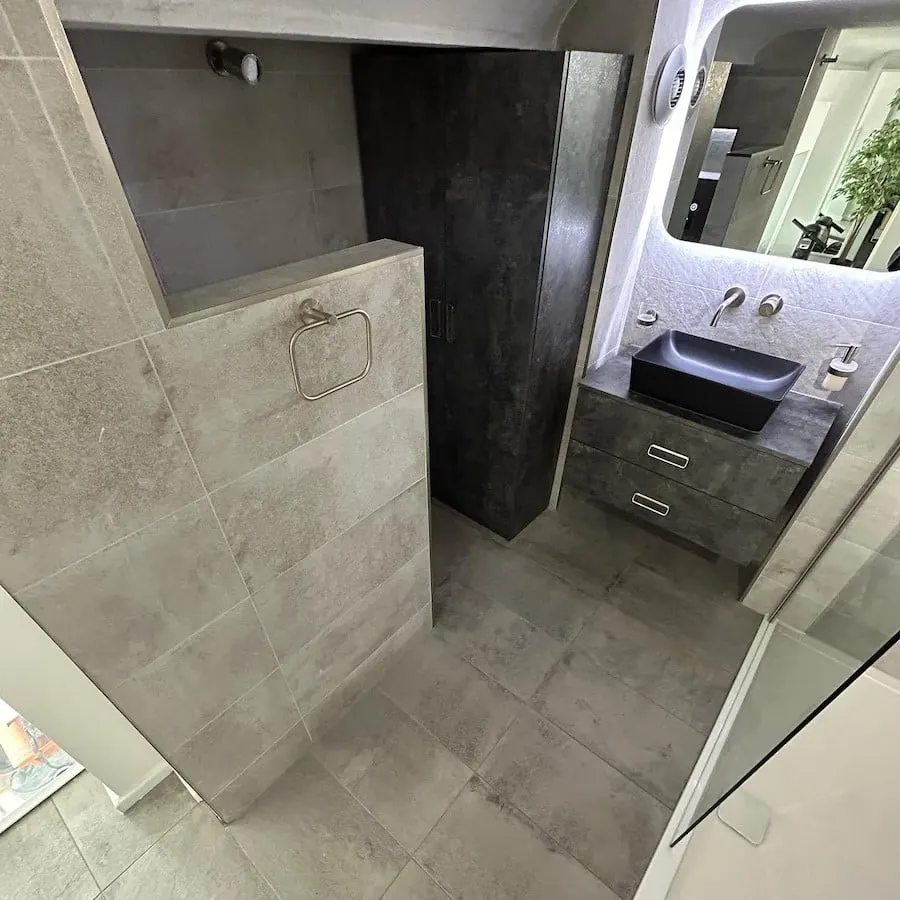 Grey porcelain bathroom with walk-in shower and floating vanity, Preston