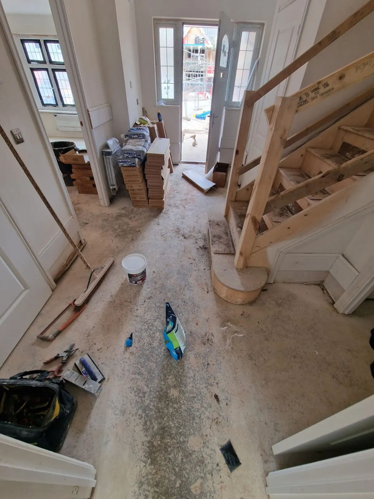 Before: hallway prepped and levelled