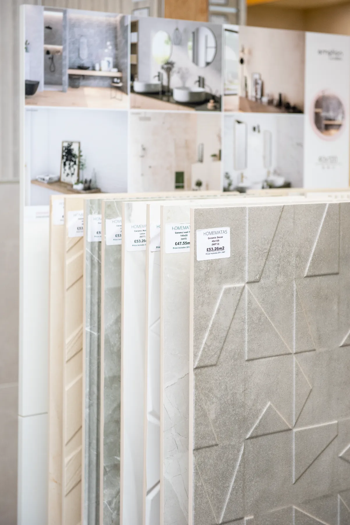 Geometric ceramic décor tiles on a showroom display rack